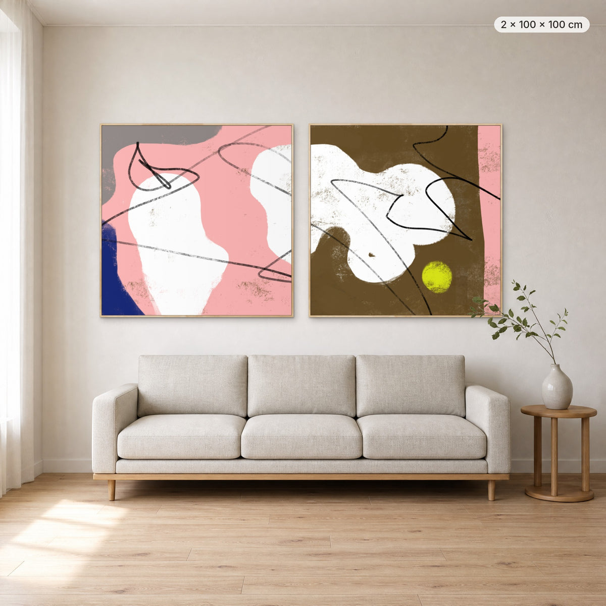 Art Wall 15 (Satisfied #1 & #2) canvas print in oak floating frame, 2 × 100 × 100 cm, shown above a 220 cm sofa