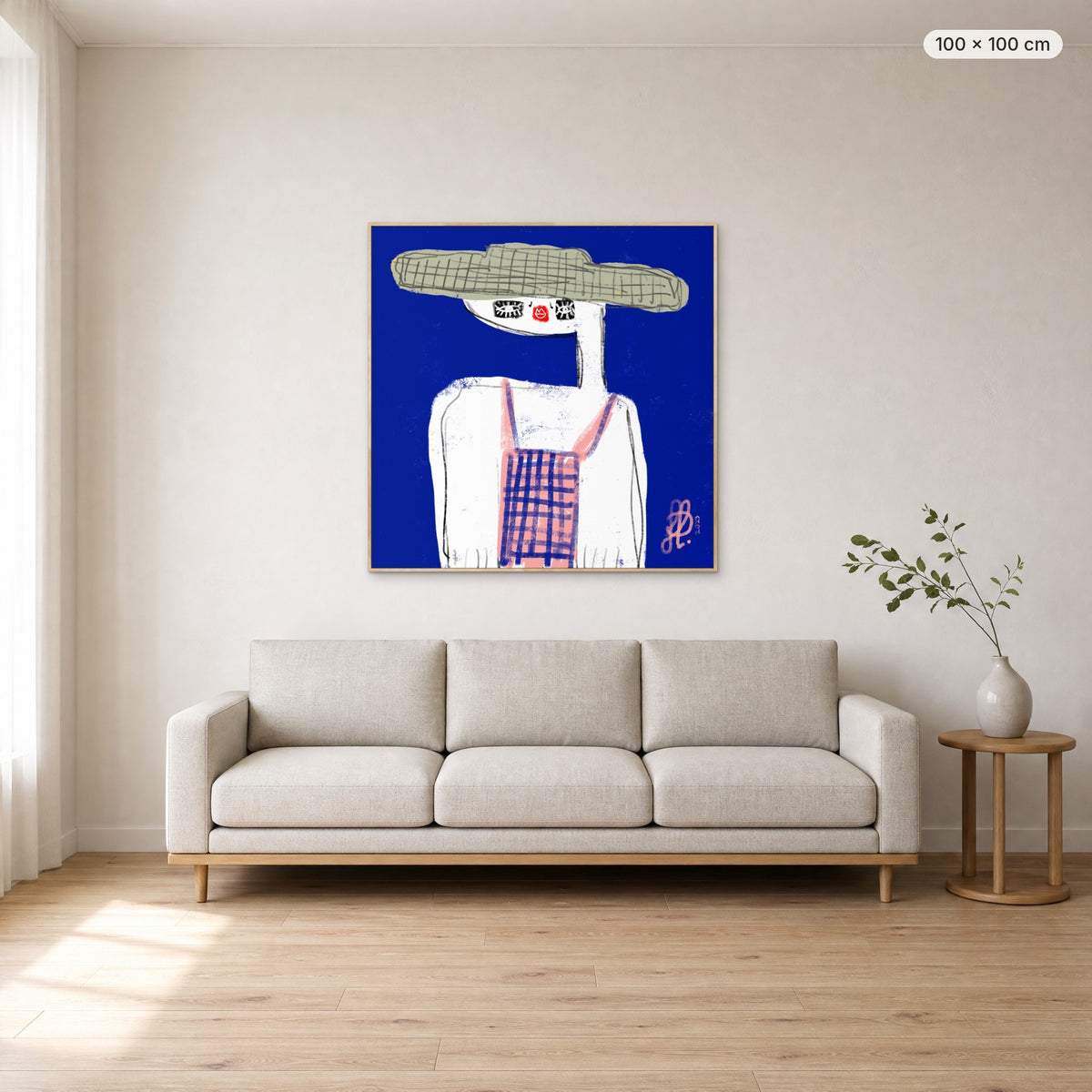 Emma canvas print in oak floating frame, 100 × 100 cm, shown above a 220 cm sofa