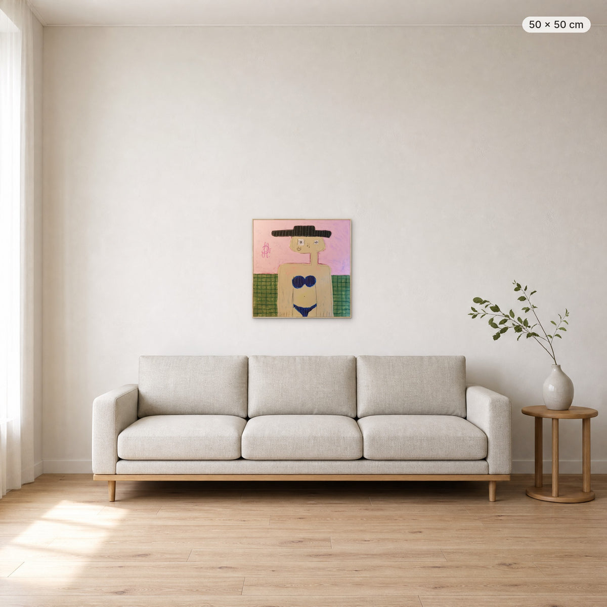 Grace canvas print in oak floating frame, 50 × 50 cm, shown above a 220 cm sofa