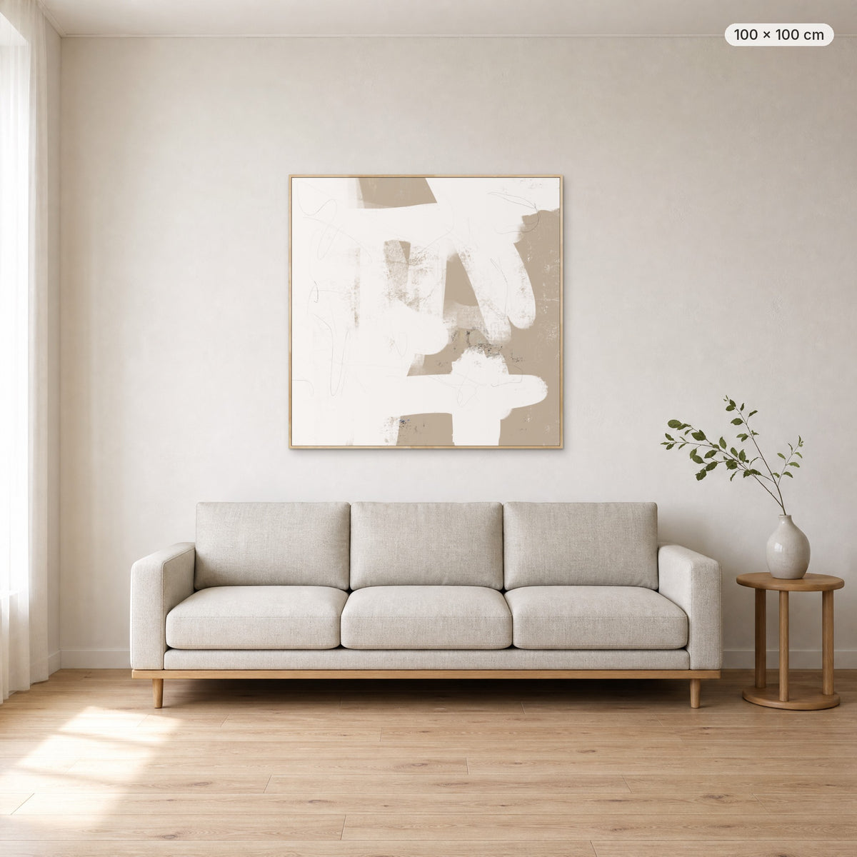 More Than Simple canvas print in oak floating frame, 100 × 100 cm, shown above a 220 cm sofa