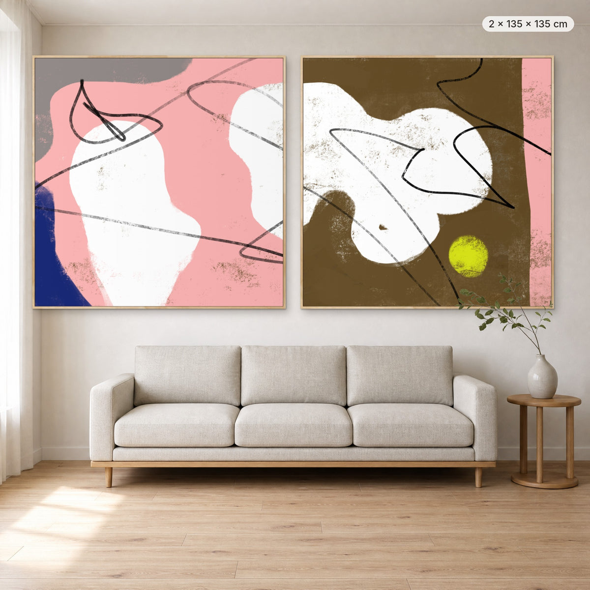 Art Wall 15 (Satisfied #1 & #2) canvas print in oak floating frame, 2 × 135 × 135 cm, shown above a 220 cm sofa