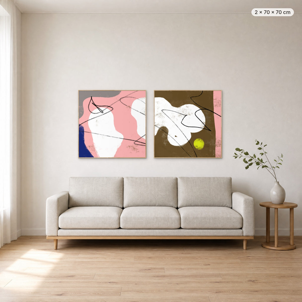 Art Wall 15 (Satisfied #1 & #2) canvas print in oak floating frame, 2 × 70 × 70 cm, shown above a 220 cm sofa