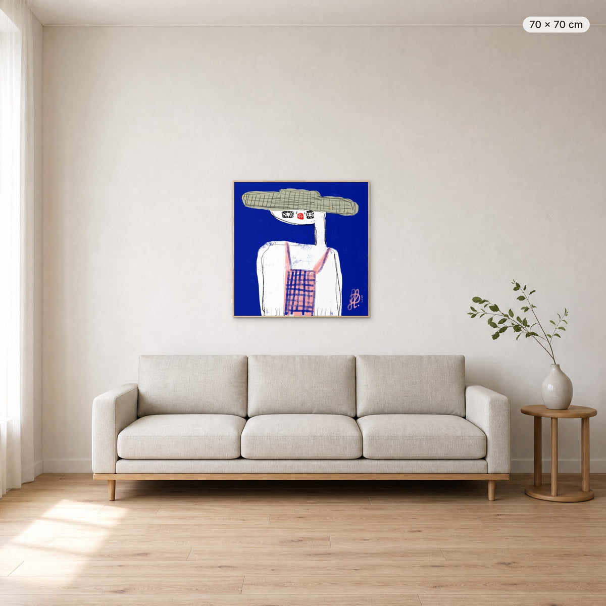 Emma canvas print in oak floating frame, 70 × 70 cm, shown above a 220 cm sofa