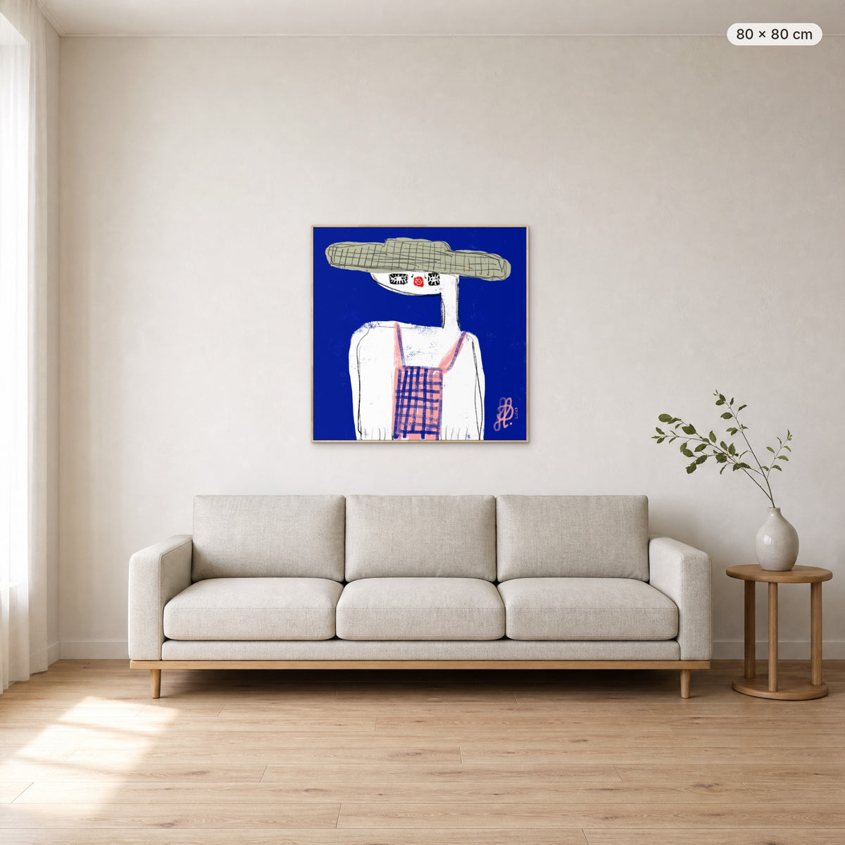 Emma canvas print in oak floating frame, 80 × 80 cm, shown above a 220 cm sofa