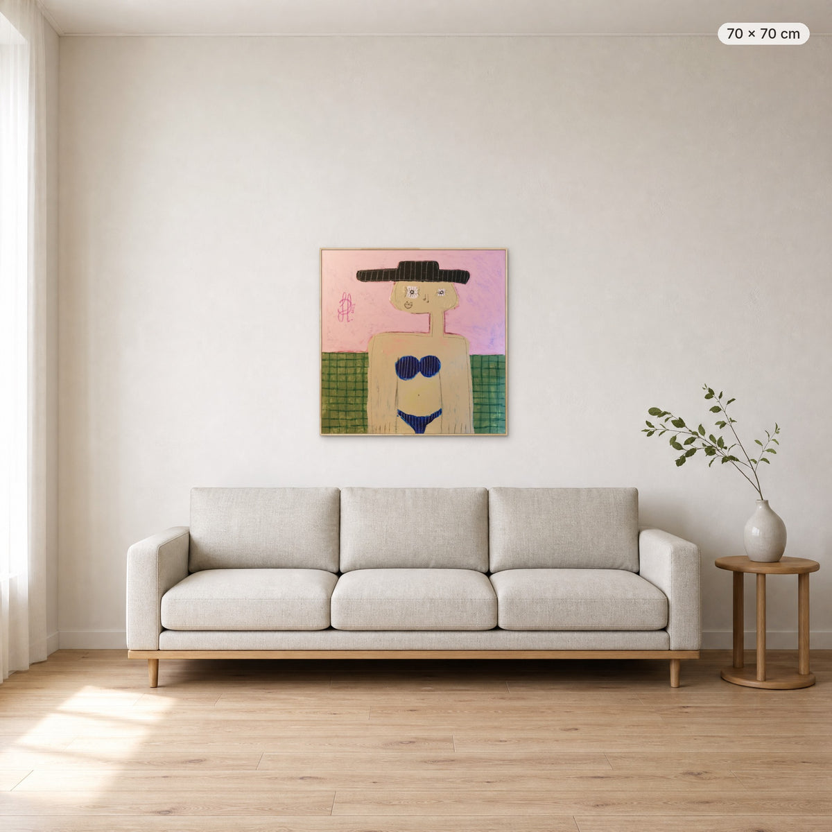 Grace canvas print in oak floating frame, 70 × 70 cm, shown above a 220 cm sofa