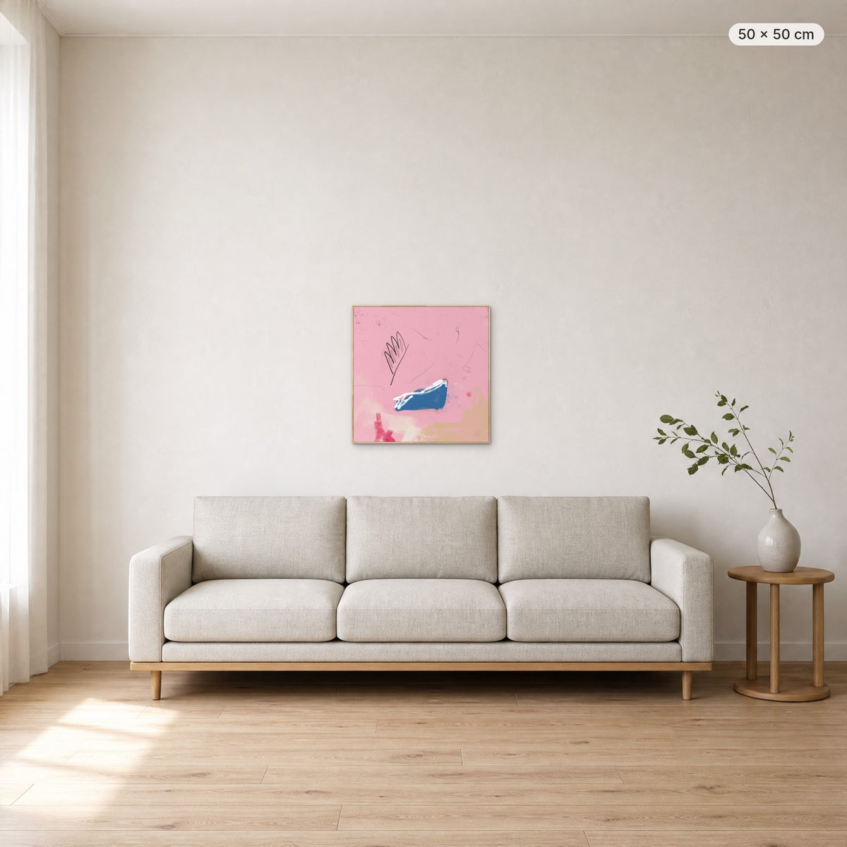 Kiss You Everywhere canvas print in oak floating frame, 50 × 50 cm, shown above a 220 cm sofa
