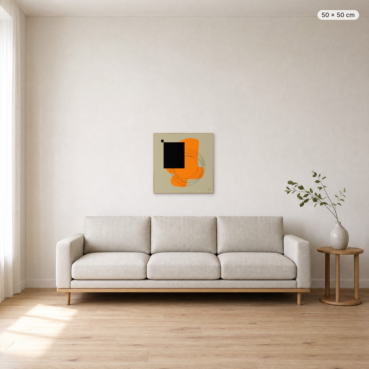 Life Is Boring Without Chaos #1 canvas print in oak floating frame, 50 × 50 cm, shown above a 220 cm sofa