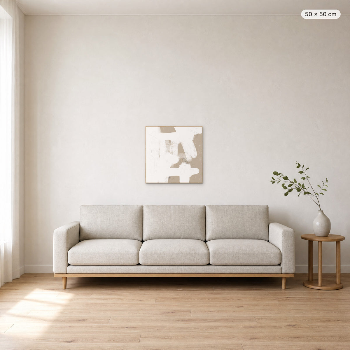 More Than Simple canvas print in oak floating frame, 50 × 50 cm, shown above a 220 cm sofa