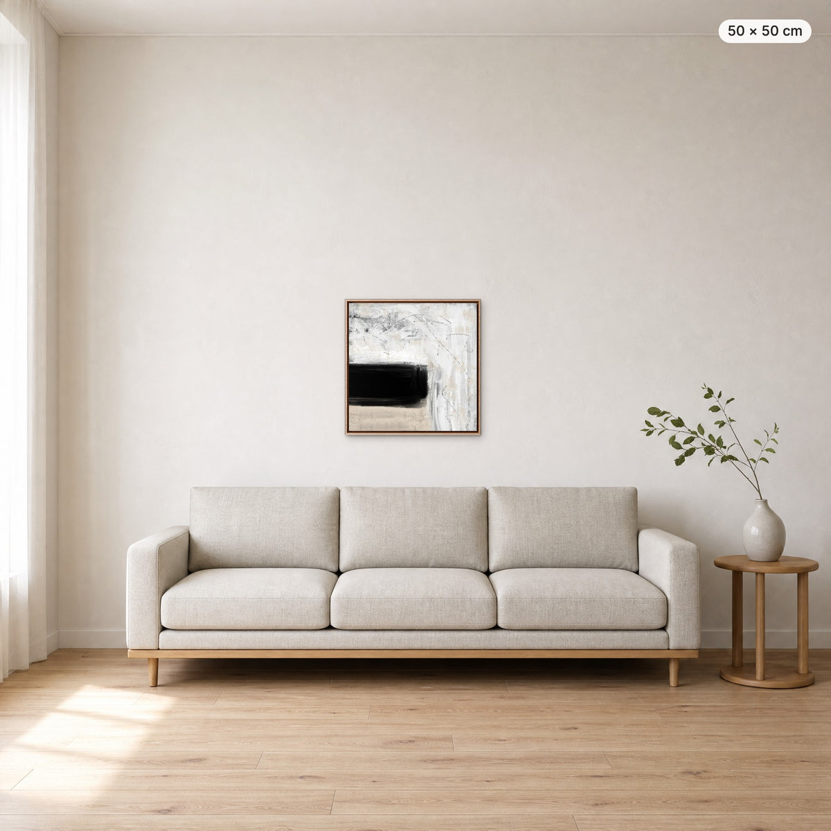 Canvas Print "Quiet" in oak frame, 50 × 50 cm, shown to scale above a 220 cm sofa