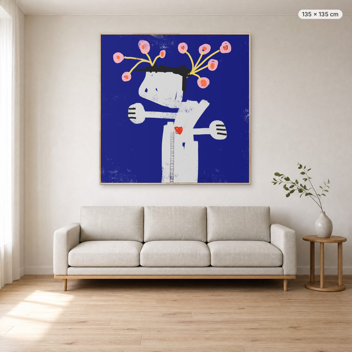 What We Water Grows canvas print in oak floating frame, 135 × 135 cm, shown above a 220 cm sofa